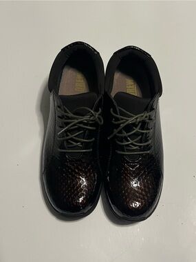 DREW Women's Patent Sneaker with Brown Highlights